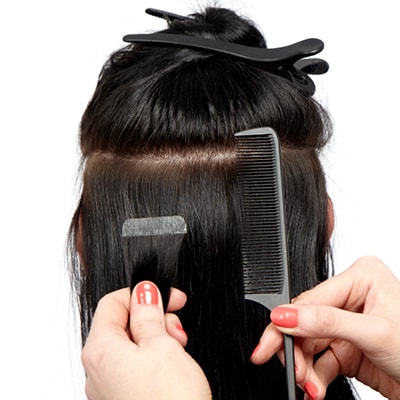 Påsætning af tape extensions Step 3