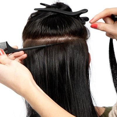Påsætning af tape extensions Step 4