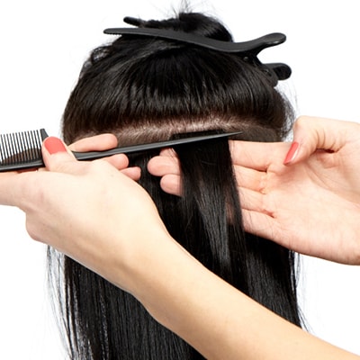 Påsætning af tape extensions Step 7