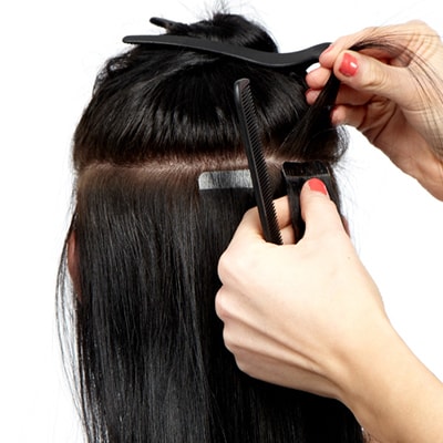 Påsætning af tape extensions Step 9